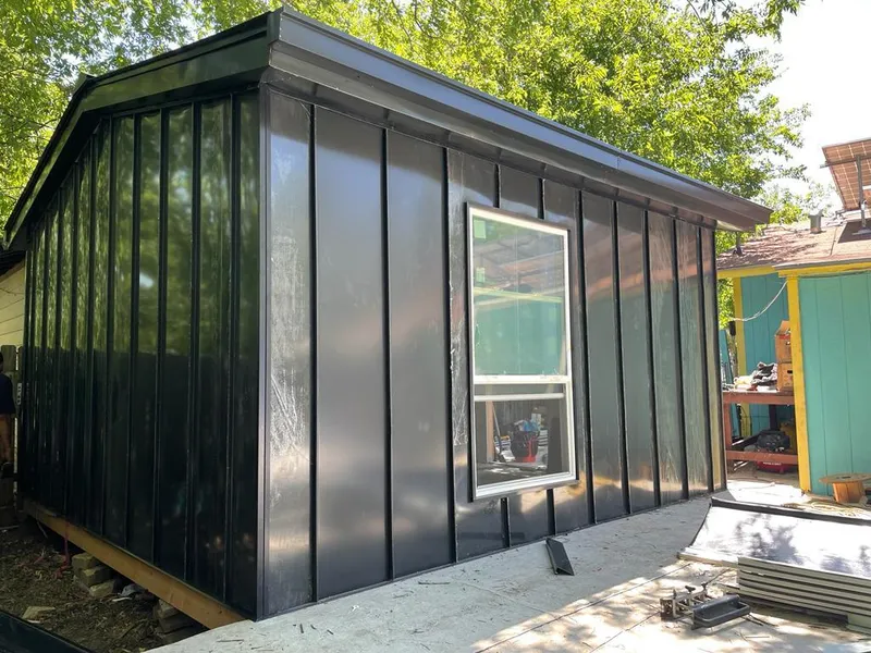 Black standing seam metal wall panels for Metal Roof Installation in Pulaski